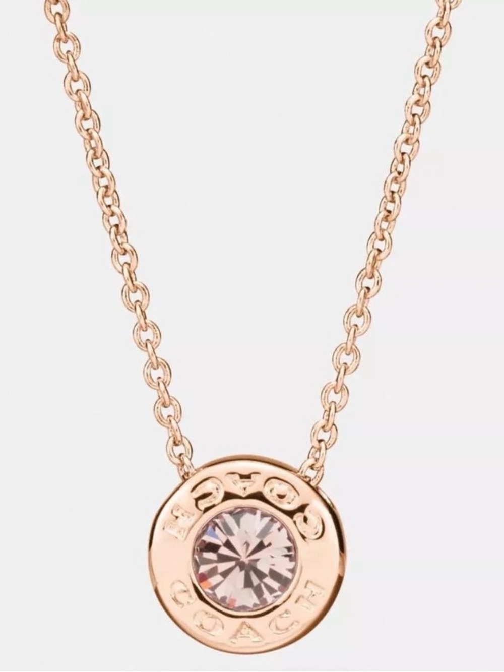 Coach Rose Gold Disc Pendant Necklace with Center Crystal
